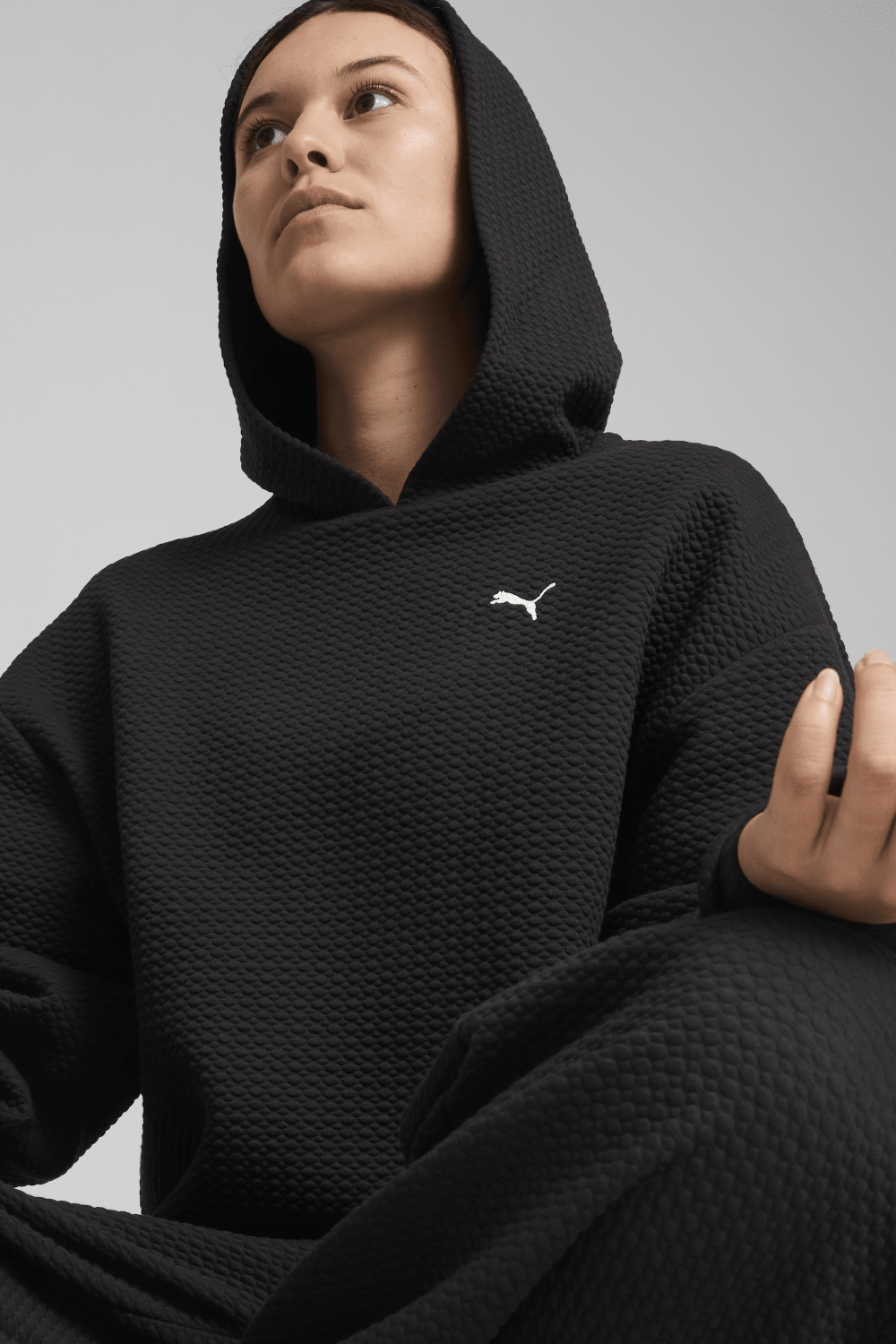 Puma-Q4 Studio Textured Hoody Puma Black-Sweatshirts & Hoodies-3-milagron.live